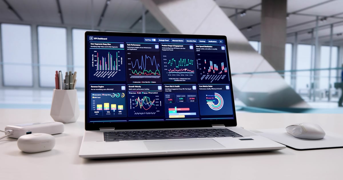 Marketing analytics dashboard on laptop showing campaign performance charts