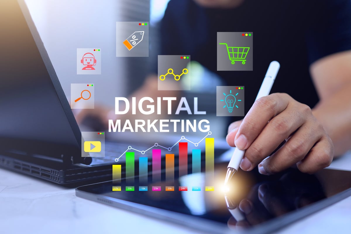 Digital marketing strategist analyzing campaign data and planning social media strategy on tablet